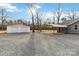Detached garage and carport with gravel driveway at 307 E Old Highway 74 None, Monroe, NC 28112