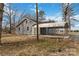Gray siding house exterior with carport at 307 E Old Highway 74 None, Monroe, NC 28112