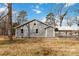 Gray house exterior with carport and large yard at 307 E Old Highway 74 None, Monroe, NC 28112