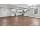 Open concept kitchen with white cabinets and granite countertops at 307 E Old Highway 74 None, Monroe, NC 28112