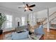 Spacious living room with hardwood floors and a view of the staircase at 3735 Providence Manor Rd, Charlotte, NC 28270