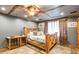 Rustic bedroom with wooden bed frame and southwestern decor at 375 W Rambo Rd, Rock Hill, SC 29730
