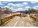 Spacious wooden deck overlooks the backyard and equestrian facilities at 375 W Rambo Rd, Rock Hill, SC 29730