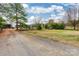 Long gravel driveway leads to the main house and equestrian facilities at 375 W Rambo Rd, Rock Hill, SC 29730