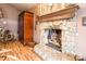 Rustic stone fireplace with wooden mantel at 375 W Rambo Rd, Rock Hill, SC 29730