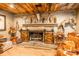 Stone fireplace with barn doors and a rustic mantel at 375 W Rambo Rd, Rock Hill, SC 29730