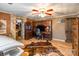 Rustic home office features built-in wooden desk, tan hide rug, and hardwood floors at 375 W Rambo Rd, Rock Hill, SC 29730