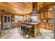 Rustic kitchen with reclaimed wood cabinets and island at 375 W Rambo Rd, Rock Hill, SC 29730