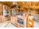 Rustic kitchen with island, double ovens, and wood accents at 375 W Rambo Rd, Rock Hill, SC 29730