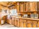 Rustic kitchen with farmhouse sink and reclaimed wood at 375 W Rambo Rd, Rock Hill, SC 29730