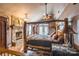 Large main bedroom with a rustic wooden bed and stone fireplace at 375 W Rambo Rd, Rock Hill, SC 29730