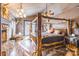 Main bedroom with a large wooden bed and access to a private patio at 375 W Rambo Rd, Rock Hill, SC 29730