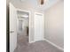 Spacious bedroom with neutral walls, gray carpet, and a large closet at 3939 Newhall Dr, Hickory, NC 28601