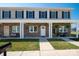 Two-story townhome with stone accents and covered porch at 3939 Newhall Dr, Hickory, NC 28601