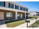 Two-story townhome with stone accents and covered porch at 3939 Newhall Dr, Hickory, NC 28601