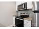 Modern kitchen with stainless steel appliances and granite countertops at 3939 Newhall Dr, Hickory, NC 28601