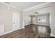 Bright and spacious living room with hardwood floors and neutral color palette at 3939 Newhall Dr, Hickory, NC 28601