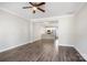 Open living room with hardwood floors and kitchen view at 3939 Newhall Dr, Hickory, NC 28601