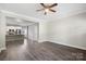 Open living room with hardwood floors and kitchen view at 3939 Newhall Dr, Hickory, NC 28601