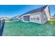 Home features a screened porch, fenced backyard, and grassy area at 40196 Crooked Stick Dr, Lancaster, SC 29720