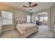 Main bedroom with carpeted floor and access to the bathroom at 40196 Crooked Stick Dr, Lancaster, SC 29720