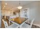 Bright dining area with wood table and access to outdoor space at 40196 Crooked Stick Dr, Lancaster, SC 29720