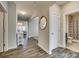 Bright and spacious entryway with hardwood floors and view of living room at 40196 Crooked Stick Dr, Lancaster, SC 29720