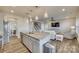 Kitchen island with granite countertop, stainless steel appliances, and open layout at 40196 Crooked Stick Dr, Lancaster, SC 29720