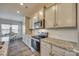 Modern kitchen with stainless steel appliances and granite countertops at 40196 Crooked Stick Dr, Lancaster, SC 29720