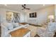 Spacious living area with hardwood floors and access to upper level at 40196 Crooked Stick Dr, Lancaster, SC 29720