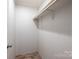 Functional closet with wood-look floors and a shelf at 607 Stewart Ct, Statesville, NC 28677