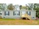 Single-wide mobile home with new siding and steps at 607 Stewart Ct, Statesville, NC 28677