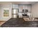 Stainless steel appliances and gray cabinets at 607 Stewart Ct, Statesville, NC 28677