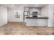 Modern kitchen with gray cabinets and stainless appliances at 607 Stewart Ct, Statesville, NC 28677