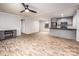 Open living space with wood-look floors and fireplace at 607 Stewart Ct, Statesville, NC 28677