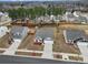 Aerial view of a house in a residential neighborhood with other houses visible at 6104 Ahoskie Dr, Charlotte, NC 28215