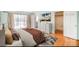 Spacious bedroom with wood floors and access to a private deck at 644 Dogwood Rd, Statesville, NC 28677