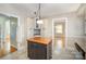 Kitchen with island and granite countertops at 644 Dogwood Rd, Statesville, NC 28677