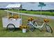 Sunflowers at roadside stand with a teal bicycle at 7016 Olive Branch Rd, Marshville, NC 28103