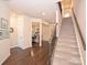 Bright entryway with hardwood floors and staircase at 7027 Walnut Branch Ln, Charlotte, NC 28277