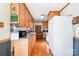 View of kitchen with wood cabinets and appliances at 821 Tomlin Mill Rd, Statesville, NC 28625