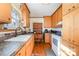 Kitchen features wood cabinets and a center island at 821 Tomlin Mill Rd, Statesville, NC 28625