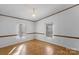 Bedroom with wood floors and window coverings at 102 Lansdale Ave, Lincolnton, NC 28092