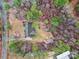 Overhead view of house, yard, and woods at 1055 Cedar Hills Ln, Lancaster, SC 29720