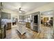 Kitchen with granite island, stainless steel appliances, and wood cabinets at 1055 Cedar Hills Ln, Lancaster, SC 29720