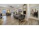 Spacious living room with hardwood floors, fireplace, and ample seating at 1055 Cedar Hills Ln, Lancaster, SC 29720