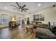 Open living area with hardwood floors, and a ceiling fan at 1055 Cedar Hills Ln, Lancaster, SC 29720
