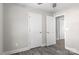 Simple bedroom with gray walls, wood-look floors, and white doors at 1166 Hoyle St, Rock Hill, SC 29732