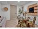 Small dining area with glass table and four gold chairs at 130 Marina Ln, Mooresville, NC 28117