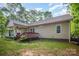 Exterior of the home featuring a cozy back porch with stairs, providing a tranquil outdoor retreat at 1313 Western Hills Ln, Vale, NC 28168